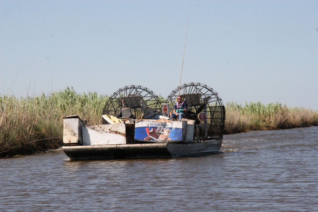 Twin-engine airboat hauls away debris from Sabine NWR
