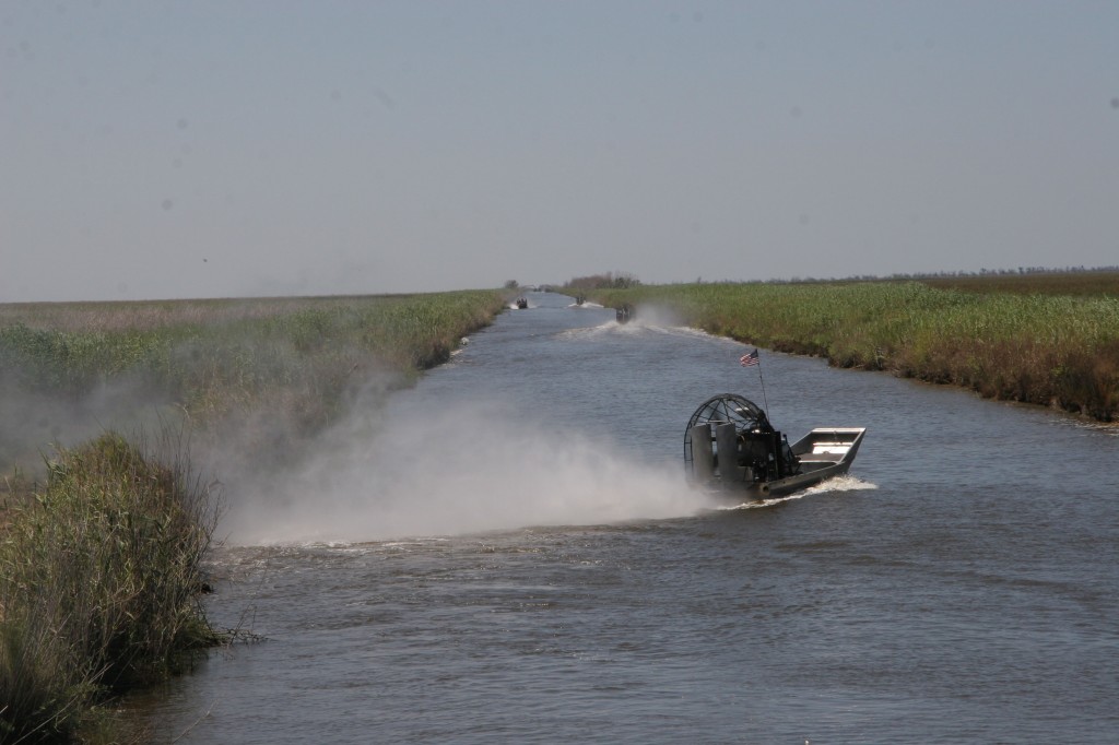 Airboats return empty back to the field for another load