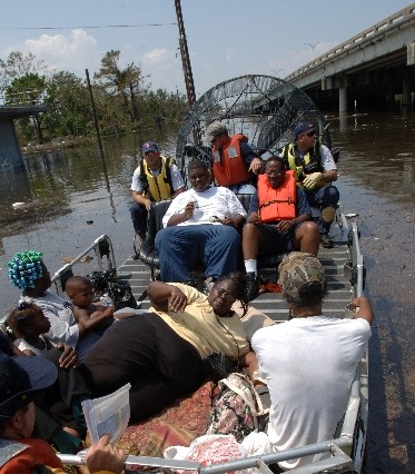 An airboat pulls up to the Memorial Medical Center in New Orleans on Wednesday, Aug. 31, 2005. Floodwaters continued to rise in the Crescent City after several levees broke, inundating the city in the wake of Hurricane Katrina. photo: Jocelyn Augustino/FEMA