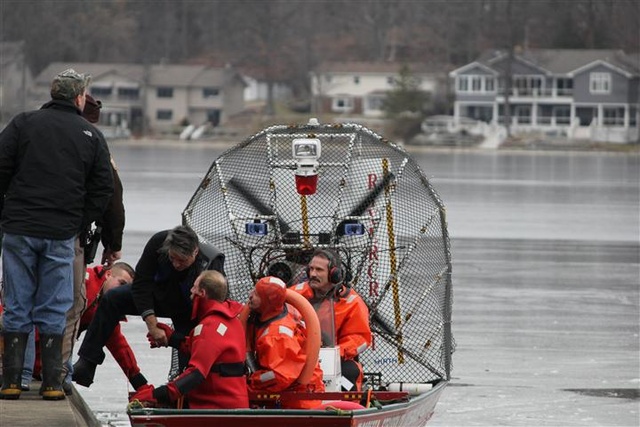 climbing out of boat