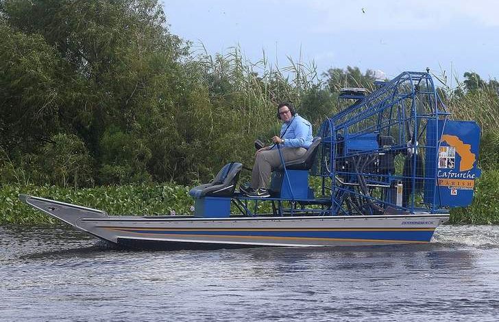 Lafourche Parish administrator Archie Chaisson drives an airboat Thursday after looking over a marsh terracing project in marshland in south Lafourche.