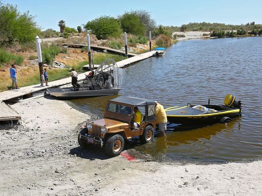 A U.S. Fish and Wildlife vehicle uses the restored launch ramp in Varner Harbor, March 24, 2016. 